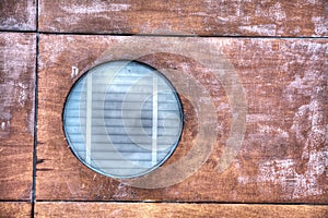 Porthole in the wood