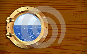 Porthole on wooden background