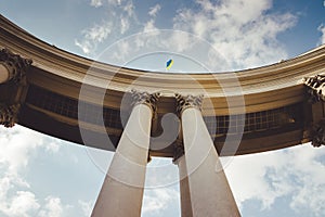 Portico of the building of the Ministry of Foreign Affairs. Ukraine flag flies on the arch of the Ministry of Foreign Affair.