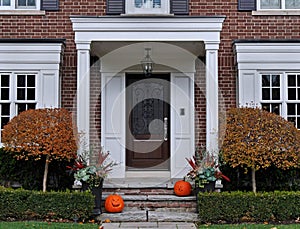 Portico entrance and pumpkins