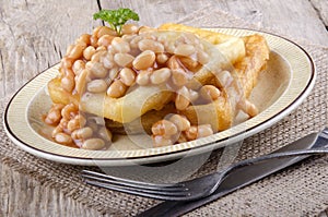 Portion baked beans and waffles