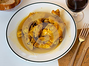 Portion of braised pig trotters with gravy