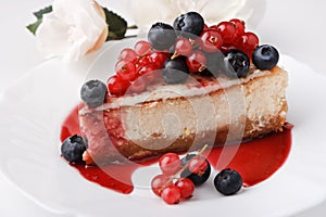 Portion of cheese cake New-York with berries