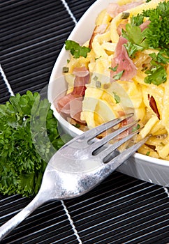 Portion of Cheese Spaetzle on black