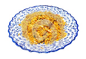 portion of Chicken biryani on plate isolated