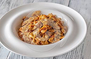 Portion of farfalle with sun-dried tomato pesto