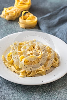 Portion of fettuccine Alfredo