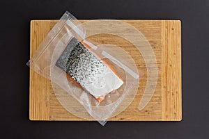 Portion of fresh Atlantic salmon in a vacuum pack
