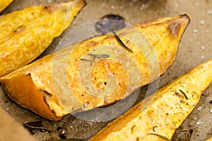 Portion of fresh baked sweet potato wedges