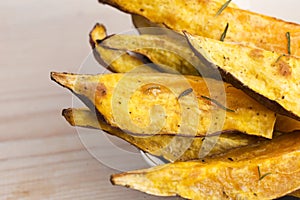 Portion of fresh baked sweet potato wedges