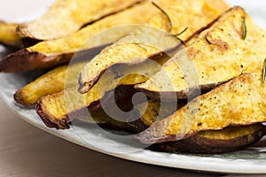 Portion of fresh baked sweet potato wedges