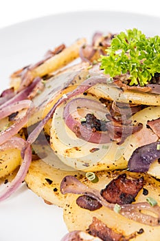 Portion of fried Potatoes on white