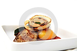 Portion of healthy grilled vegetables on square plate with white space background