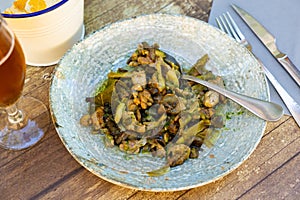 Portion of lechecillas de ternasco served on table photo