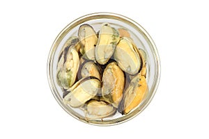 A portion of marinated sea mussels in a glass cup