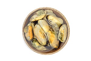 A portion of marinated sea mussels in a wooden cup