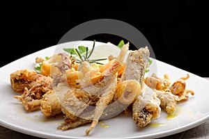 A portion of mixed fried fish photo