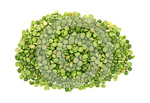 Portion of organic green split peas on white a background