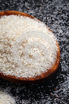 Portion of Psyllium Seeds on rustic dark background. Psyllium se