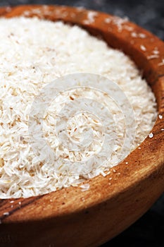 Portion of Psyllium Seeds on rustic dark background. Psyllium se