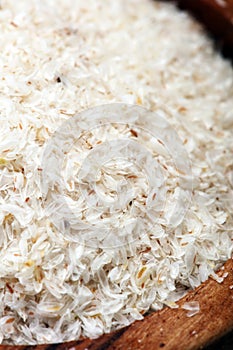 Portion of Psyllium Seeds on rustic dark background. Psyllium se