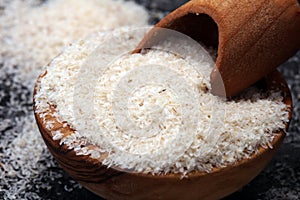 Portion of Psyllium Seeds on rustic dark background. Psyllium se