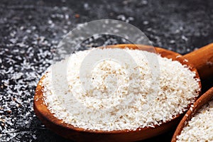 Portion of Psyllium Seeds on rustic dark background. Psyllium se