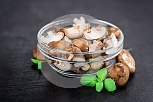 Portion of Raw Shiitake mushrooms on a slate slab