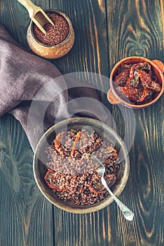 Portion of red quinoa with sun-dried tomatoes