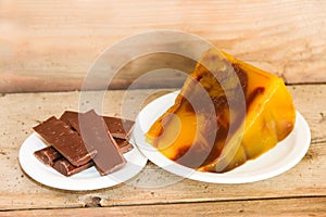 portion of sweet potato with chocolate and chocolate bars photo