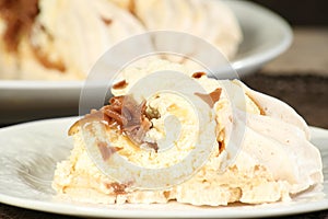 Portion of toffee pavlova