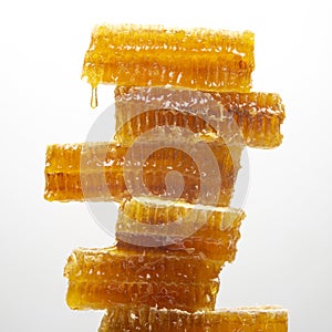Portions of fresh honeycomb on a white background. vitamin natural food. bee work product