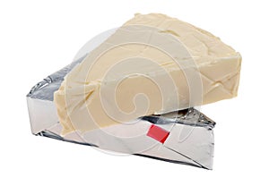 Portions of spreadable cheese including one open close-up on white background