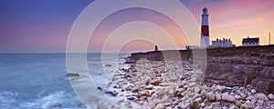 The Portland Bill Lighthouse in Dorset, England at sunset