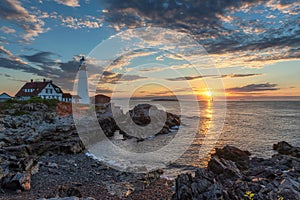 Portland Head Lighthouse at sunrise in Maine