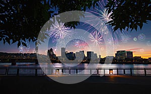 Portland, Oregon city skyline during new years eve with exploding fireworks