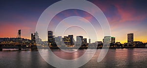 Portland, Oregon city skyline panorama with Hawthorne bridge.