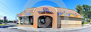 Exterior of Taco Bell fast-food restaurant with sign and logo