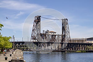 Portland Oregon Summer Boating on Willamette River with Steel Bridge on a sunny day