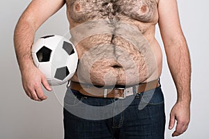 Portly belly of a man football photo