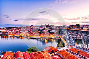 Porto Aerial Cityscape with Illuminated Luis I Bridge and Douro River at Dusk