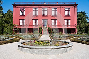 Porto Botanical Garden. Main entrance, pink facade of Casa Andresen, Porto, Portugal photo