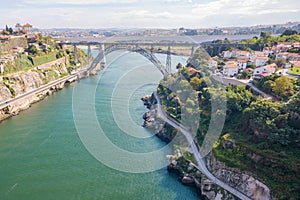 Porto bridge aerial river with a boat