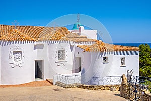 Porto Cervo, Sardinia, Italy - Chiesa Stella Maris church overlooking port and residences of Porto Cervo resort at the Costa