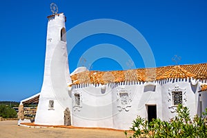 Porto Cervo, Sardinia, Italy - Chiesa Stella Maris church overlooking port and residences of Porto Cervo resort at the Costa