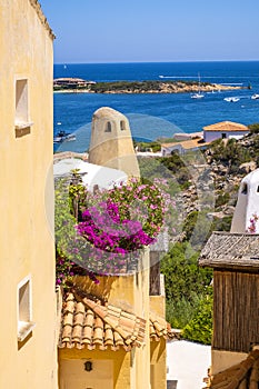 Porto Cervo, Sardinia, Italy - Picturesque view of luxury yacht port, marina and residences of Porto Cervo resort at the Costa