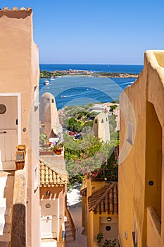 Porto Cervo, Sardinia, Italy - Picturesque view of luxury yacht port, marina and residences of Porto Cervo resort at the Costa