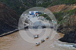 Porto das Barcas, a small fishing cove in the Costa Vicentina natural park, Portugal photo