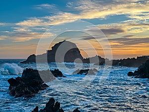 Porto Moniz - Panoramic view of volcanic rock formation Ilheu Mole in coastal town Porto Moniz, Madeira island, Portugal, Europe