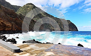 Porto Moniz - rocks and waves at vulcanic coast - beautiful landscape scenery of Madeira Island, Portugal photo